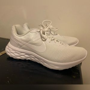 White Nike running shoes